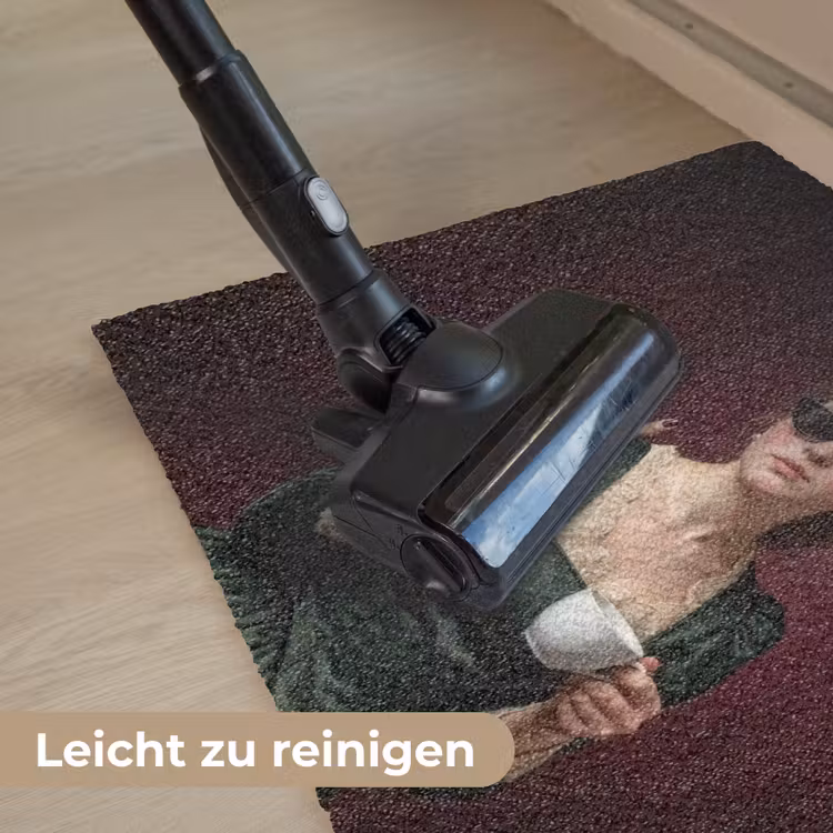 Koffie - Vrouw - Middelvinger Deurmat klein -reinigen_DE