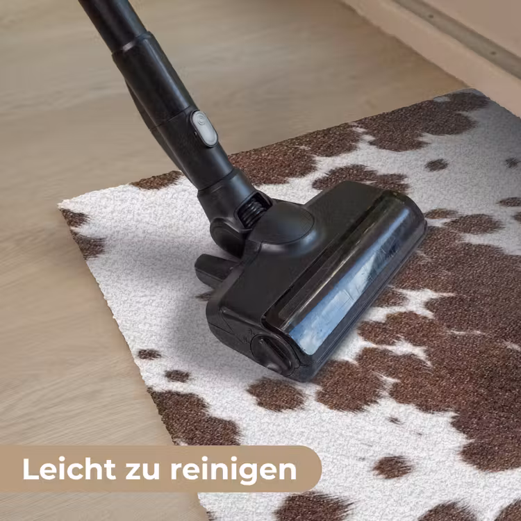 Koeienhuid - Klassiek - Bruin Deurmat klein -reinigen_DE