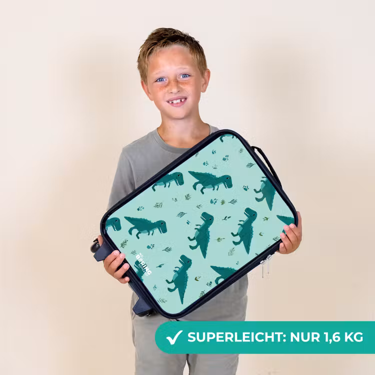 Vriendelijke T. rex tussen sporen Kinderkoffer - Zwart klein -sfeer4_DE