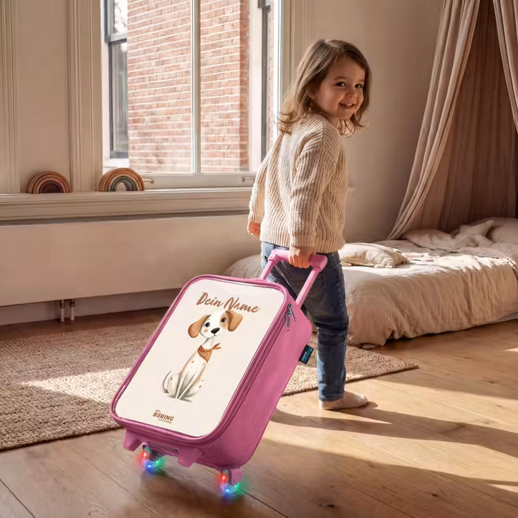 Bruin gevlekte pup op een beige achtergrond Kinderkoffer - Roze klein -sfeer1
