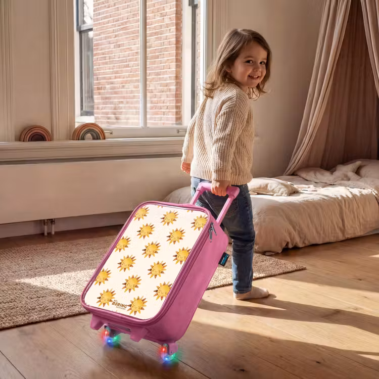 Lachende zonnetjes als patroon op beige achtergrond Kinderkoffer - Roze klein -sfeer1