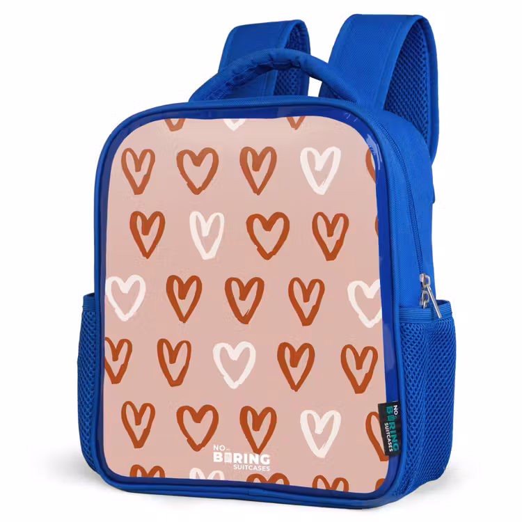 Hartjes patroon in roze en wit Kinderrugzak - Blauw middel -schuin