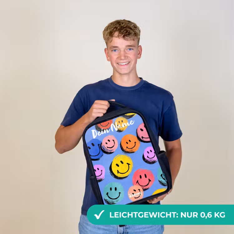 Een speels en kunstzinnig patroon van kleurrijke smileys Rugzak - Zwart middel -sfeer7_DE