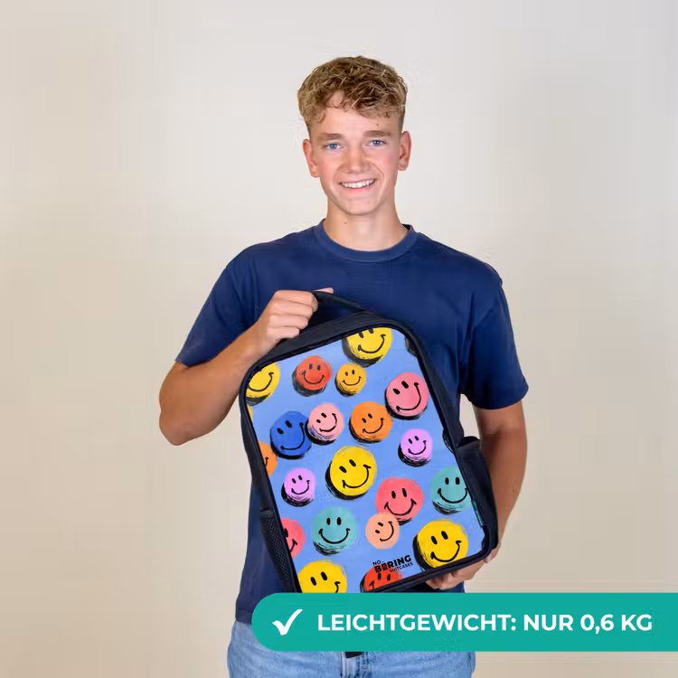 Een speels en kunstzinnig patroon van kleurrijke smileys Rugzak - Zwart middel -sfeer7_DE