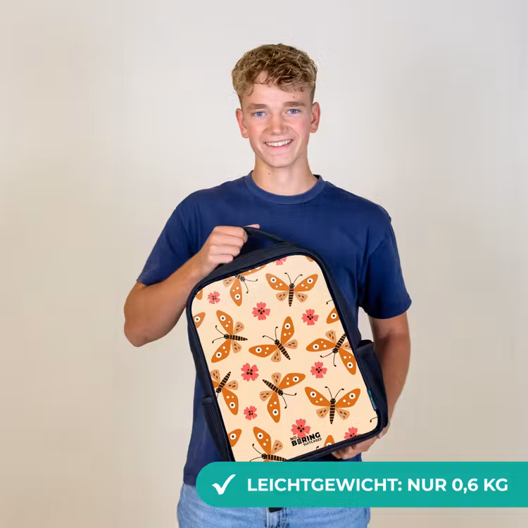 Oranje vlinders en roze bloemen op beige achtergrond Rugzak - Zwart middel -sfeer7_DE