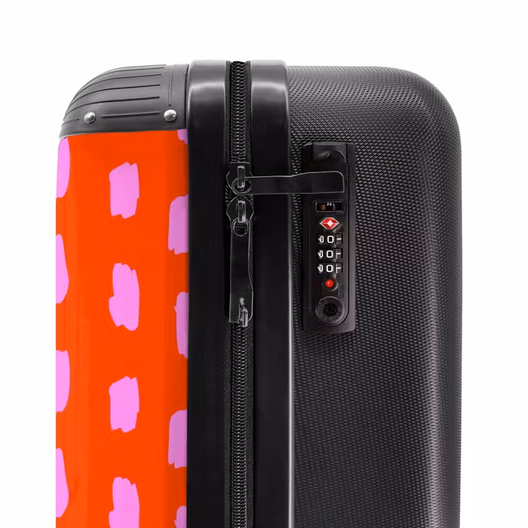 Vlekkenpatroon in roze op felrode achtergrond NBS - Handbagage koffer - Kinderen Unisex middel -slot