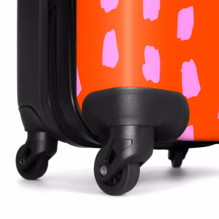 Vlekkenpatroon in roze op felrode achtergrond NBS - Handbagage koffer - Kinderen Unisex middel -wiel