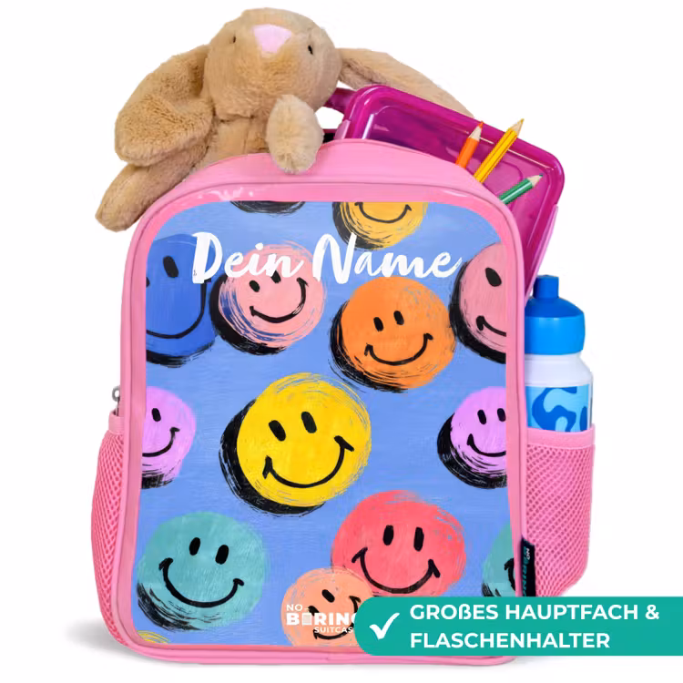 Een speels en kunstzinnig patroon van kleurrijke smileys Kinderrugzak - Roze middel -inhoud_DE