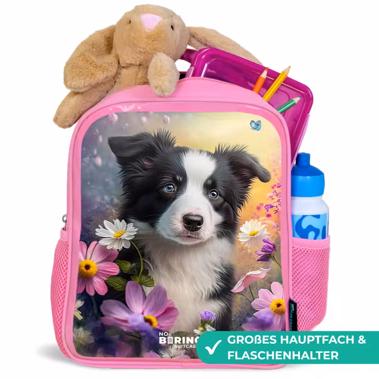 zwart witte puppy tussen kleurrijke bloemen Kinderrugzak - Roze middel -inhoud_DE